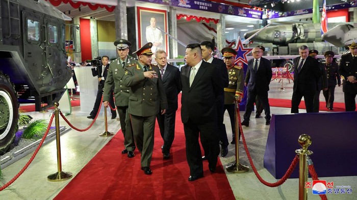 North Korean leader Kim Jong Un, accompanied by Russias defense minister Sergei Shoigu and Chinese Communist Party Politburo member Li Hongzhong, greets children as he attends a performance in Pyongyang, in this image released by North Koreas Korean Central News Agency on July 27, 2023.  KCNA via REUTERS    ATTENTION EDITORS - THIS IMAGE WAS PROVIDED BY A THIRD PARTY. REUTERS IS UNABLE TO INDEPENDENTLY VERIFY THIS IMAGE. NO THIRD PARTY SALES. SOUTH KOREA OUT. NO COMMERCIAL OR EDITORIAL SALES IN SOUTH KOREA.
