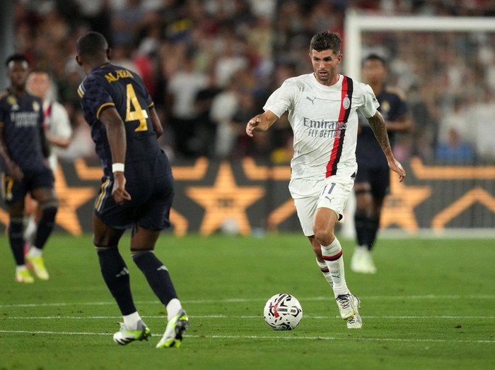 Jul 23, 2023; Pasadena, California, USA; AC Milan forward Christian Pulisic (11) moves the ball against Real Madrid in the second half at the Rose Bowl. Mandatory Credit: Kirby Lee-USA TODAY Sports