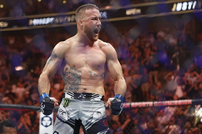 Jul 29, 2023; Salt Lake City, Utah, USA; Dustin Poirier (red gloves) fights Justin Gaethje (blue gloves) during UFC 291 at Delta Center. Mandatory Credit: Jeff Swinger-USA TODAY Sports