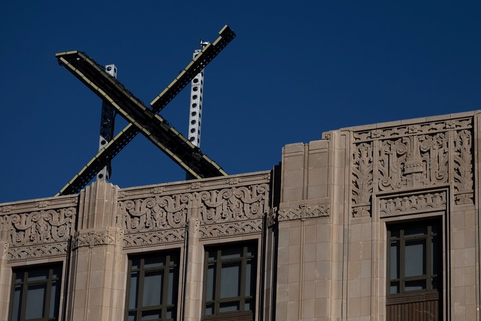 X logo is seen on the top of the headquarters of the messaging platform X, formerly known as Twitter, in downtown San Francisco, California, U.S., July 30, 2023.  REUTERS/Carlos Barria