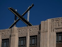 X logo is seen on the top of the headquarters of the messaging platform X, formerly known as Twitter, in downtown San Francisco, California, U.S., July 30, 2023.  REUTERS/Carlos Barria
