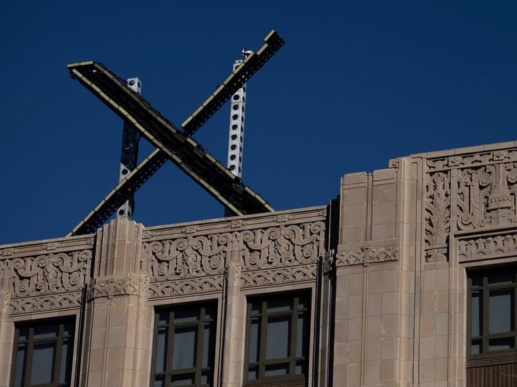 X logo is seen on the top of the headquarters of the messaging platform X, formerly known as Twitter, in downtown San Francisco, California, U.S., July 30, 2023.  REUTERS/Carlos Barria