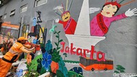 Ada juga gambar Monas dan ondel-ondel.  