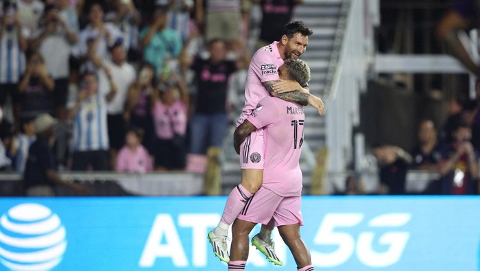 Aug 2, 2023; Fort Lauderdale, FL, USA;  Inter Miami CF forward Lionel Messi (10) is congratulated after scoring a goal against Orlando City SC during the second half at DRV PNK Stadium. Mandatory Credit: Nathan Ray Seebeck-USA TODAY Sports