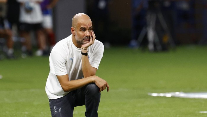 Soccer Football - Pre Season Friendly - Yokohama F Marinos v Manchester City - Japan National Stadium, Tokyo, Japan - July 23, 2023 Manchester City manager Pep Guardiola looks on REUTERS/Kim Kyung-Hoon