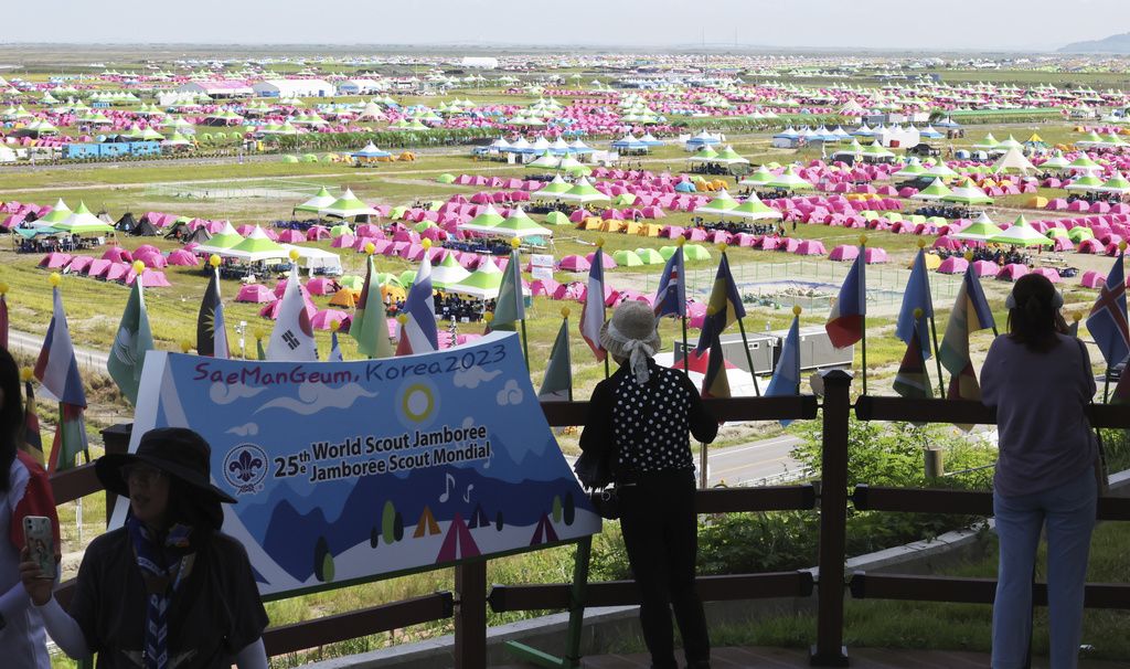 Tents are pitched at a scout camping site during the World Scout Jamboree in Buan, South Korea, Friday, Aug. 4, 2023. More than 100 people were treated for heat-related illnesses at the World Scout Jamboree being held in South Korea, which is having one of its hottest summers in years. (Choe Young-soo/Yonhap via AP)