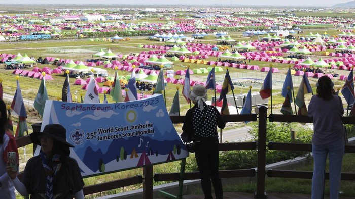 Tents are pitched at a scout camping site during the World Scout Jamboree in Buan, South Korea, Friday, Aug. 4, 2023. More than 100 people were treated for heat-related illnesses at the World Scout Jamboree being held in South Korea, which is having one of its hottest summers in years. (Choe Young-soo/Yonhap via AP)