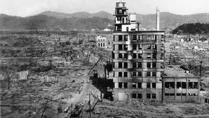 The shell of a building stands amid acres of rubble in this view of the Japanese city of Hiroshima, Aug. 8, 1945.  (AP Photo/Mitsugi Kishida)