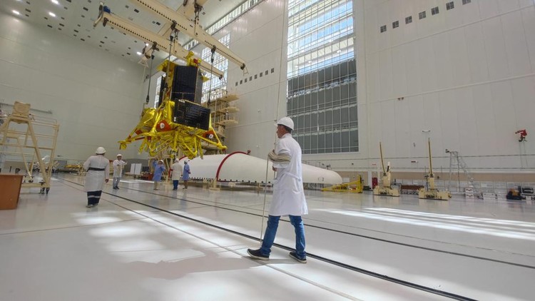 Specialists take part in preparations ahead of the launch of the lunar landing spacecraft Luna-25 mission to search for ice near the south pole of the moon, at the Vostochny Cosmodrome in the Amur region, Russia, in this handout photo published August 1, 2023. Roscosmos/Vostochny Space Centre/Handout via REUTERS ATTENTION EDITORS - THIS IMAGE HAS BEEN SUPPLIED BY A THIRD PARTY. MANDATORY CREDIT.