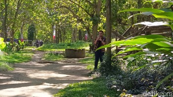 Kedua seseorang yang tengah melakukan pemotretan. Foto: Adi Fida Rahman/detikINET