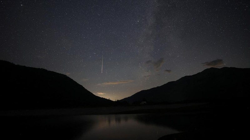 A  view of meteor streaks in the night sky during annual Perseid meteor shower at Shebenik National Park, in Fushe Stude, Albania, August 13, 2023. REUTERS/Florion Goga