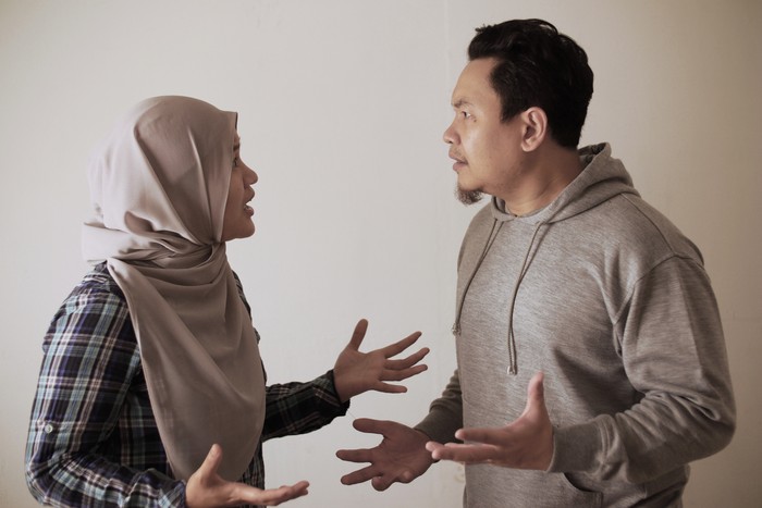 Asian muslim couple husband and wife having fight, argue and ignoring on each other, bad relationship in marriage concept
