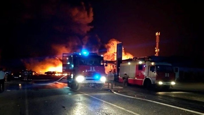 Rescuers work to put out a fire at the accident scene following an explosion at a gas station in the city of Makhachkala, Russia, August 14, 2023. Russian Emergencies Ministry in the Republic of Dagestan/Handout via REUTERS