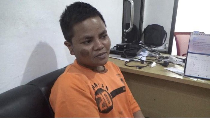 Tampang Harina alias Nos (32) wanita biadab yang membunuh ayahnya, Sarkawi (60).