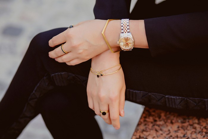 Beautiful jewelry, bracelets, watches, rings, female hands. Close-up