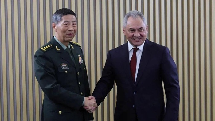 Chinese Defense Minister Li Shangfu met with his Russian counterpart Sergei Shoigu on the sidelines of a security conference in Moscow on August 15. (Russian Defence Ministry/Reuters)