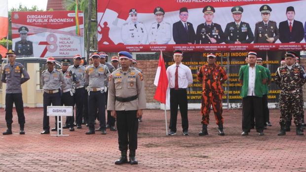 Robert Herison (22) tersangka pengalungan bendera ke anjing ikut apel kebangsaan. (Dok Polres Bengkalis)