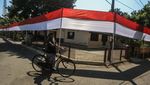 Bingkai Sepekan: Pengibaran Sang Saka Merah Putih Terbesar-Terunik