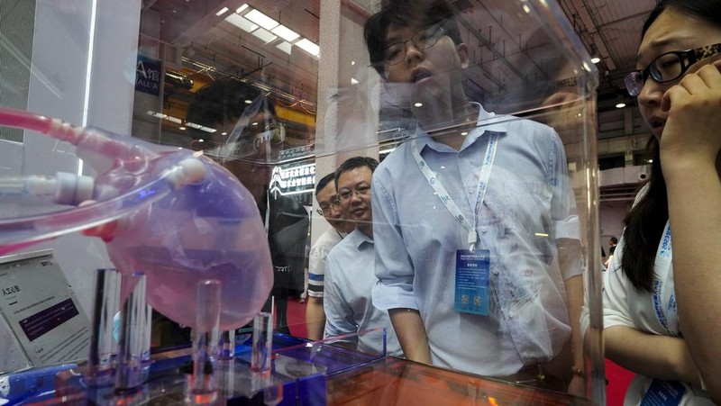 An artificial heart is displayed at the annual World Robot Conference at the Beijing Etrong International Exhibition and Convention Center on Wednesday, Aug. 16, 2023. (AP Photo/Ng Han Guan)