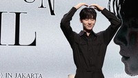 Hwang Minhyun membagikan sedikit TMI saat konferensi pers. (Foto: Atmi Ahsani Yusron/detikcom)