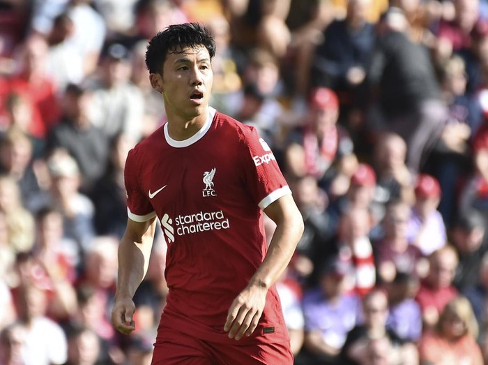 Liverpools Waturo Endo in action during the Premier League soccer match between Liverpool and AFC Bournemouth at Anfield, in Liverpool, England, Saturday, Aug. 19, 2023. (AP Photo/Rui Vieira)