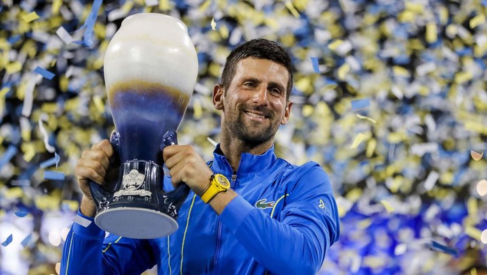 Aug 20, 2023; Mason, OH, USA; Novak Djokovic (SRB) kisses the Rookwood Cup after the victory over Carlos Alcaraz (ESP) during the men’s singles final of the Western and Southern Open tennis tournament at Lindner Family Tennis Center. Mandatory Credit: Katie Stratman-USA TODAY Sports