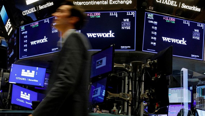 FILE PHOTO: WeWork logos are seen at a WeWork office in San Francisco, California, U.S. September 30, 2019.  REUTERS/Kate Munsch/File Photo