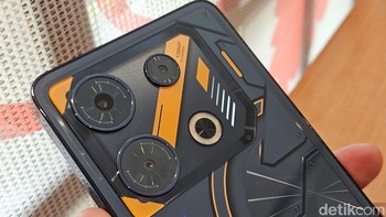 Indikator mini-LED yang interaktif dan dapat disesuaikan. Fitur ini memungkinkan pengguna untuk mengekspresikan individualitas mereka melalui pencahayaan yang dapat diatur sesuai preferensi. Selain itu, desain bodi belakang telah diperhatikan dengan baik untuk memberikan ketahanan dan kenyamanan ergonomis saat gameplay intens. Foto: Adi Fida Rahman/detikINET