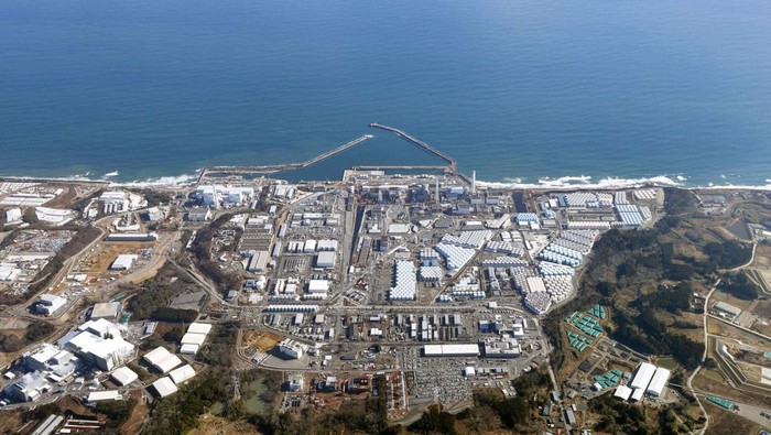 A crane ship is seen near the discharge outlet meant to release Advanced Liquid Processing System (ALPS) treated water into the sea off the tsunami-crippled Fukushima Daiichi nuclear power plant in Okuma town, Fukushima prefecture, Japan August 22, 2023, in this photo taken by Kyodo. Mandatory credit Kyodo via REUTERS ATTENTION EDITORS - THIS IMAGE WAS PROVIDED BY A THIRD PARTY. MANDATORY CREDIT. JAPAN OUT. NO COMMERCIAL OR EDITORIAL SALES IN JAPAN