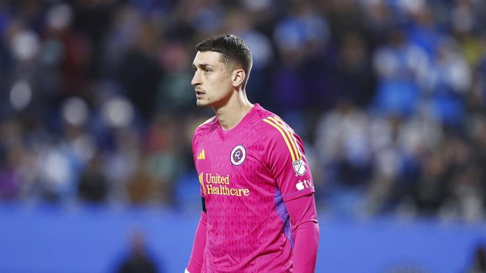 New England Revolution goalkeeper Djordje Petrović (99) during an MLS soccer match against the Charlotte FC, Saturday, Feb. 25, 2023, in Charlotte, N.C. (AP Photo/Brian Westerholt)