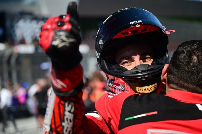 Ducati Lenovo Team Italian rider Francesco Bagnaia shows a thumbs up as he celebrates winning the sprint race at the Red Bull Ring race track in Spielberg bei Knittelfeld, Austria on August 19, 2023, ahead of the MotoGP Austrian Grand Prix. (Photo by Jure Makovec / AFP)