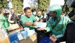 Grab Bagikan 125 Ribu Masker untuk Pengemudi dan Penumpang