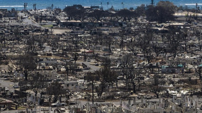 A general view shows the aftermath of a devastating wildfire in Lahaina, Hawaii, Tuesday, Aug. 22, 2023. Two weeks after the deadliest U.S. wildfire in more than a century swept through the Maui community of Lahaina, authorities say anywhere between 500 and 1,000 people remain unaccounted for. (AP Photo/Jae C. Hong)