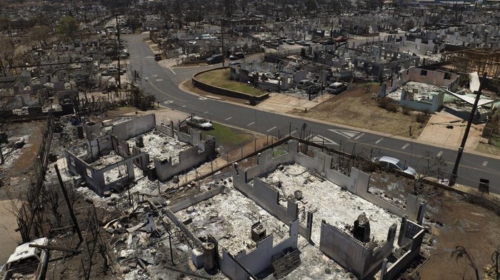 A general view shows the aftermath of a devastating wildfire in Lahaina, Hawaii, Tuesday, Aug. 22, 2023. Two weeks after the deadliest U.S. wildfire in more than a century swept through the Maui community of Lahaina, authorities say anywhere between 500 and 1,000 people remain unaccounted for. (AP Photo/Jae C. Hong)