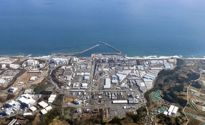 A crane ship is seen near the discharge outlet meant to release Advanced Liquid Processing System (ALPS) treated water into the sea, off the tsunami-crippled Fukushima Daiichi nuclear power plant in Okuma town, Fukushima prefecture, Japan August 22, 2023, in this photo taken by Kyodo. Mandatory credit Kyodo via REUTERS ATTENTION EDITORS - THIS IMAGE WAS PROVIDED BY A THIRD PARTY. MANDATORY CREDIT. JAPAN OUT. NO COMMERCIAL OR EDITORIAL SALES IN JAPAN