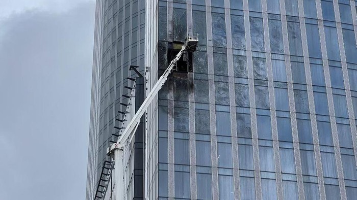 A view shows the damaged facade of a high-rise building in the Moscow City following an alleged Ukrainian drone attack in Moscow, Russia, August 23, 2023. REUTERS/Stringer