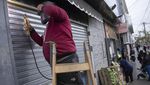 Antisipasi Penjarahan, Toko-toko di Argentina Dipasang Pintu Logam