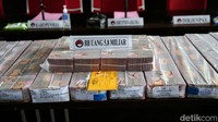 Uang tunai yang disita senilai Rp 5,9 miliar.  