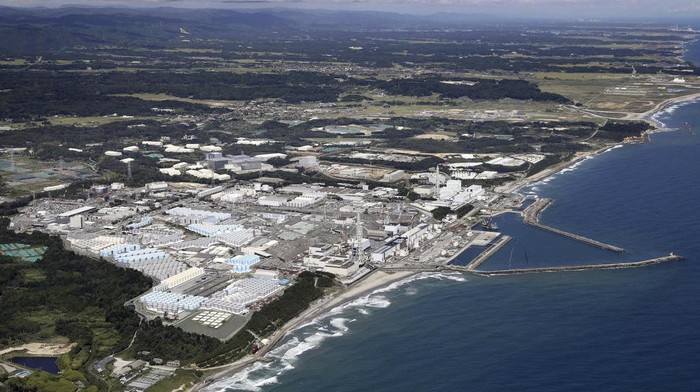 This aerial view shows the Fukushima Daiichi nuclear power plant in Fukushima, northern Japan, Thursday, Aug. 24, 2023. The operator of the tsunami-wrecked Fukushima Daiichi nuclear power plant says it has begun releasing its first batch of treated radioactive water into the Pacific Ocean — a controversial step, but a milestone for Japan’s battle with the growing radioactive water stockpile.(Kyodo News via AP)