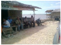Pulau Cangkir: Destinasi Wisata Religi, Wisata Alam, dan Belanja Ikan