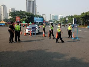 Melihat Uji Coba Tilang Uji Emisi Kendaraan Bermotor di Kawasan Senayan