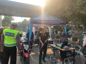 Melihat Uji Coba Tilang Uji Emisi di Terminal Blok M yang Dimulai Hari Ini