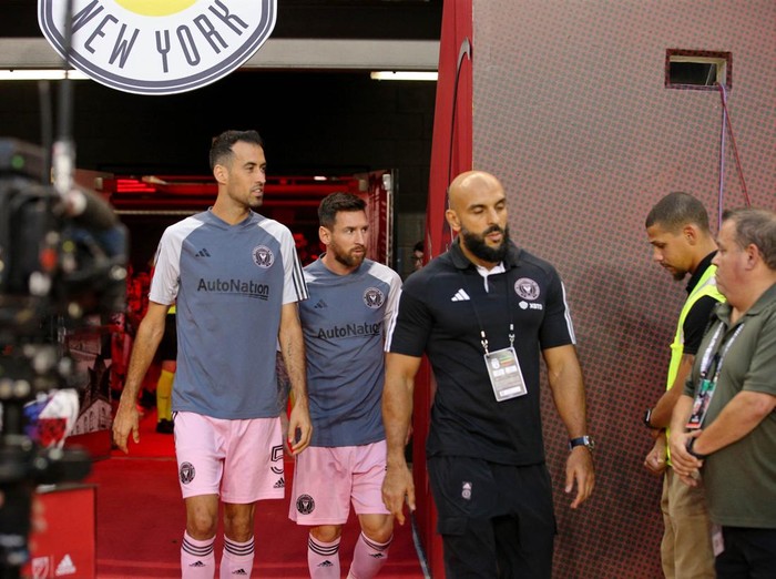 Aug 26, 2023; Harrison, New Jersey, USA; Inter Miami CF forward Lionel Messi (10) and midfielder Sergio Busquets (5) walk in the tunnel before the game against the New York Red Bulls at Red Bull Arena. Mandatory Credit: Brad Penner-USA TODAY Sports