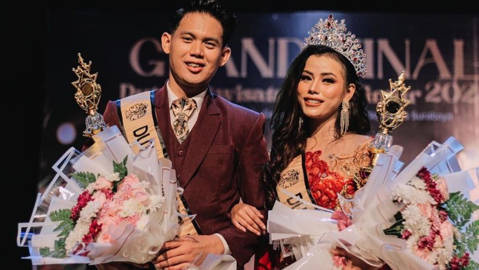 Duta Pariwisata Jawa Timur 2023 Ifan Muhammad dan
Devina Helmalia.
