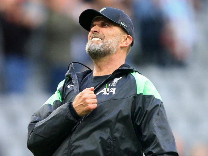 Liverpool's German manager Jurgen Klopp celebrates after the final whistle during the English Premier League football match between Newcastle United and Liverpool at St James' Park in Newcastle-upon-Tyne, north east England on August 27, 2023. (Photo by Lindsey Parnaby / AFP) / RESTRICTED TO EDITORIAL USE. No use with unauthorized audio, video, data, fixture lists, club/league logos or 'live' services. Online in-match use limited to 120 images. An additional 40 images may be used in extra time. No video emulation. Social media in-match use limited to 120 images. An additional 40 images may be used in extra time. No use in betting publications, games or single club/league/player publications. /