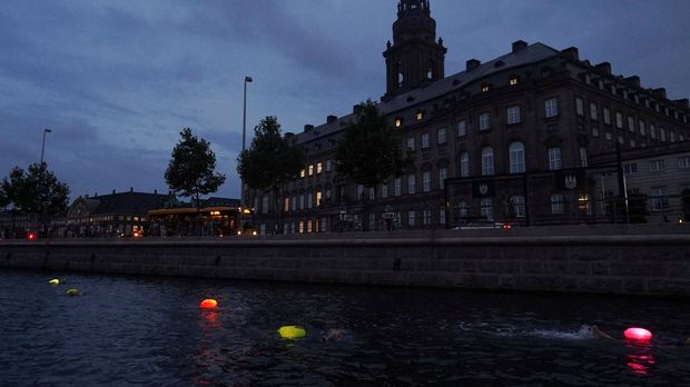 Participants take part in swims through the waterways of the Danish capital as part of TrygFonden Swim event in Copenhagen, Denmark, August 25, 2023. REUTERS/Tom Little