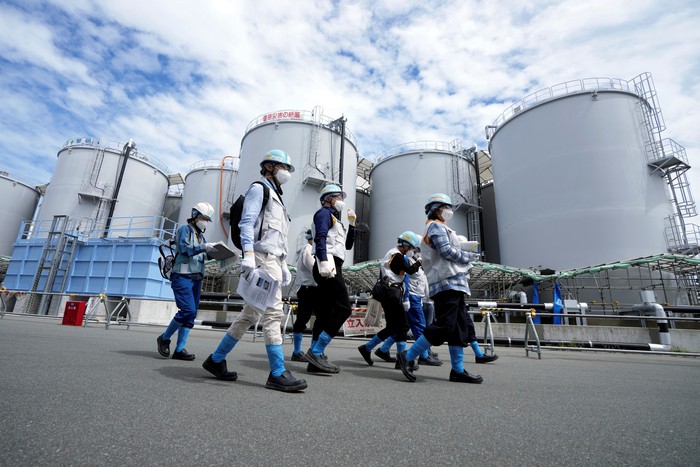 Blue pipelines to transport seawater, part of the facility for releasing treated radioactive water to sea from the Fukushima Daiichi nuclear power plant, operated by Tokyo Electric Power Company Holdings, also known as TEPCO, are seen during a treated water dilution and discharge facility tour for foreign media, in Futaba town, northeastern Japan, Sunday, Aug. 27, 2023.     Eugene Hoshiko/Pool via REUTERS