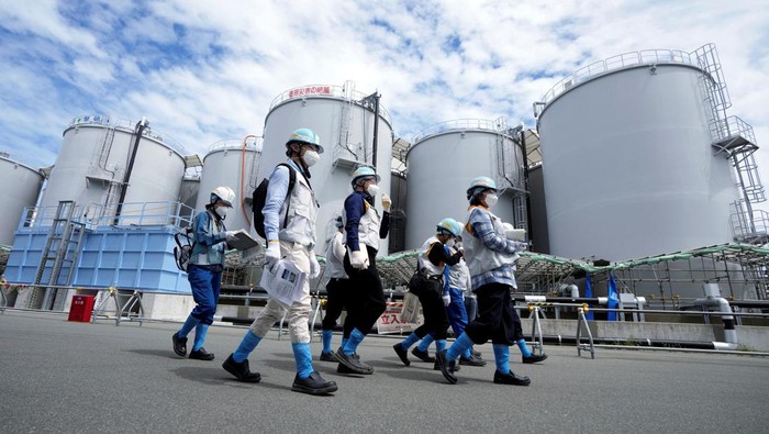 Blue pipelines to transport seawater, part of the facility for releasing treated radioactive water to sea from the Fukushima Daiichi nuclear power plant, operated by Tokyo Electric Power Company Holdings, also known as TEPCO, are seen during a treated water dilution and discharge facility tour for foreign media, in Futaba town, northeastern Japan, Sunday, Aug. 27, 2023.     Eugene Hoshiko/Pool via REUTERS