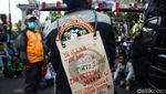 Minta Payung Hukum, Massa Ojol Geruduk Patung Kuda