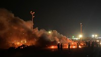 Pertemuan tersebut menimbulkan perdebatan karena Libya tidak secara resmi mengakui Israel dan terdapat dukungan publik yang luas di seluruh spektrum politik Libya untuk perjuangan Palestina. Palestina berupaya mendirikan negara merdeka di wilayah yang direbut Israel dalam perang Timur Tengah tahun 1967. REUTERS/Hani Amara  